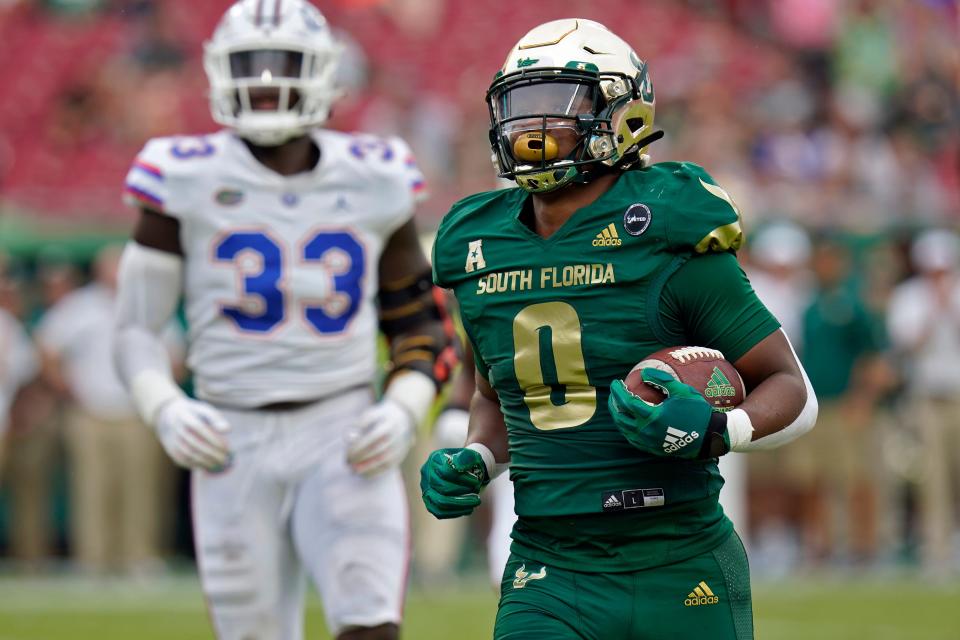South Florida running back Jaren Mangham scores a touchdown against Florida during the second half Sept. 11, 2021, in Tampa, Fla.
