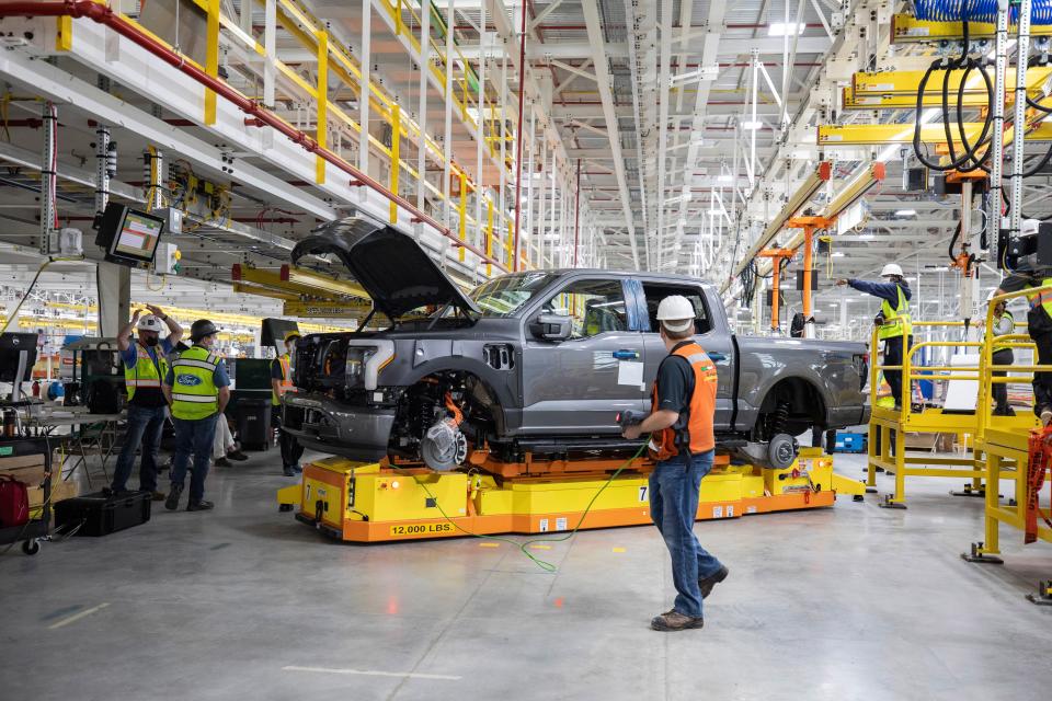 One year after Ford confirmed construction of the Rouge Electric Vehicle Center in Dearborn, Michigan, the first Ford F-150 Lightning pre-production units begin leaving the factory. The pre-production model is shown.