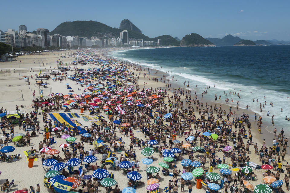 Argentina's Boca Juniors fans gather on Copacabana beach in Rio de Janeiro, Brazil, Friday, Nov. 3, 2023. Boca Juniors will face Brazil's Fluminense for the Copa Libertadores championship match on Nov. 4. (AP Photo/Bruna Prado)