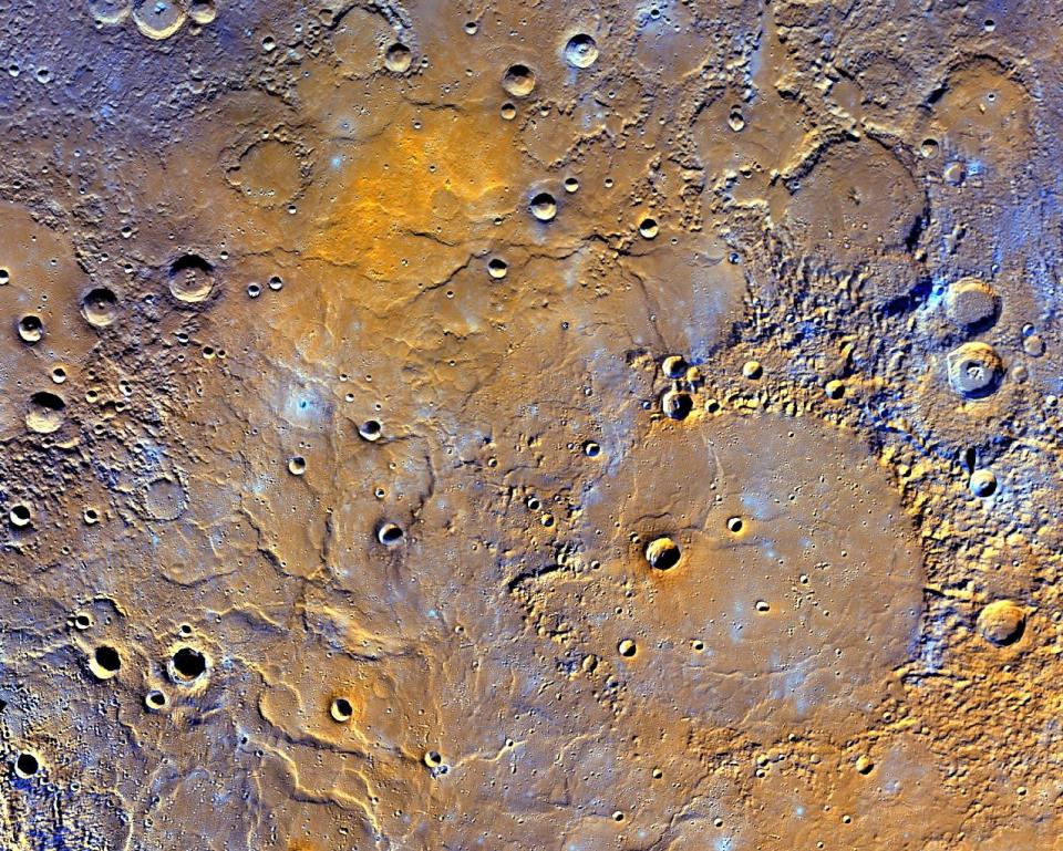 This enhanced map of Mercury's northern pole exaggerates the colors to reveal insights about the different types of rocks on the planet's surface. The 181-mile-wide (291 kilometers) Mendelssohn impact basin show