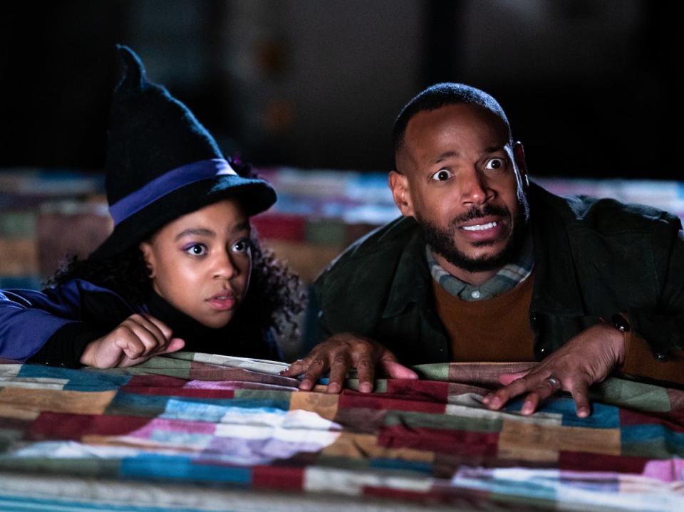 Priah Ferguson as Sydney, Marlon Wayans as Howard in ‘The Curse of Bridge Hollow' (Frank Masi/Netflix)