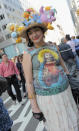 NEW YORK, NY - APRIL 24: A Parade goer models her hat during the 2011 Easter parade and Easter bonnet festival on the Streets of Manhattan on April 24, 2011 in New York City. (Photo by Jemal Countess/Getty Images)