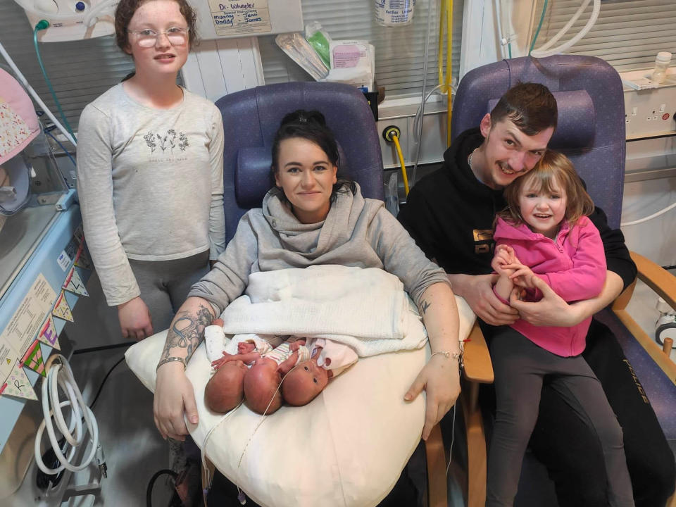 The girls meeting their older sisters. L-R Danica Casper, 10, mum Jenni Casper 27, Dad James Casper, 26 and Gabriella Casper 4 with newly born triplets, Evalynn Casper, Harper-Gwen Casper and Marvella Casper. (James Casper/SWNS)