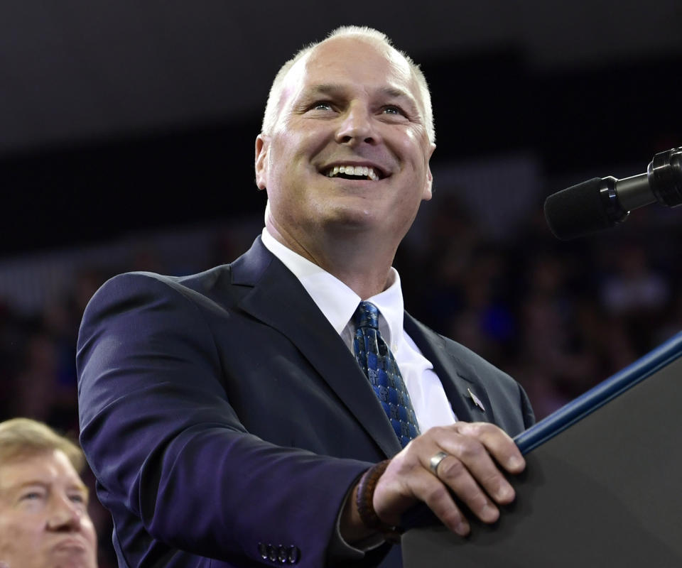 FILE - In this June 20, 2018 file photo, Pete Stauber, a Republican congressional candidate running in a traditionally Democratic district, speaks during a rally at AMSOIL Arena in Duluth, Minn. Stauber is locked in a tight race with Democrat Joe Radinovich. (AP Photo/Susan Walsh, File)