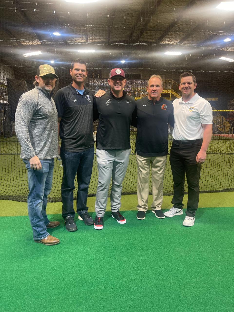 Left to right: Tallahaseee Powermill Training Academy instructor Chris Chavez, Tallahassee Community College baseball coach Bryan Henry, Florida State University baseball assistant coach Rich Wallace, Florida A&M University baseball head coach Jamey Shouppe, and Tallahassee Powermill Training Academy owner and operator Bryan Brown poses for photo at recruiting workshop at Powermill Training Academy, Tallahassee, Florida, Monday, Jan. 23, 2023