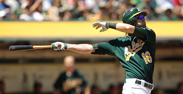 Josh Reddick keeps an eye on his old Oakland A's teammates