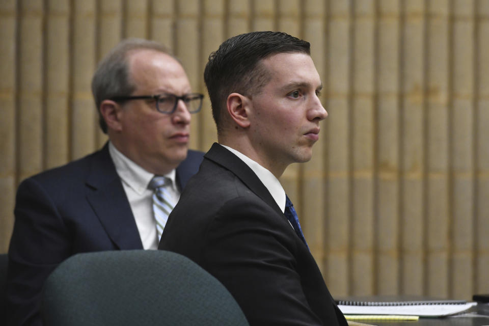 State Trooper Brian North listens to closing arguments in Connecticut Superior Court on the eighth day of his trial in Milford, Conn., Wednesday, March 13, 2024. North is charged with manslaughter for shooting 19-year-old Mubarak Soulemane in January 2020 in West Haven after a chase from Norwalk on Interstate 95. (Ned Gerard/Hearst Connecticut Media via AP, Pool)