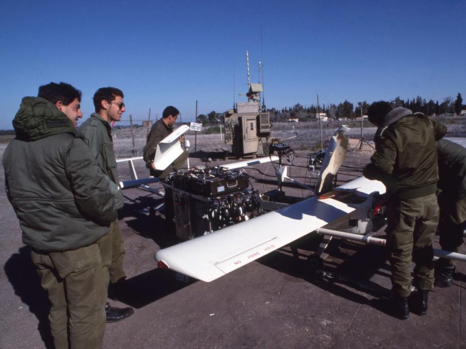 People are seen working on an Israeli army spy drone in the 1990s.