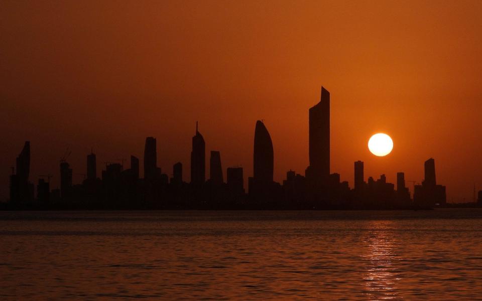 Kuwait City skyline at sunset - AFP