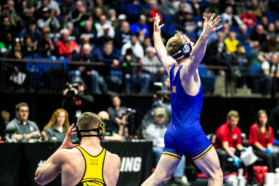 South Dakota State's Tanner Sloan, right, reacts after his match against Missouri's Rocky Elam at 197 pounds in the semifinals during the fourth session of the NCAA Division I Wrestling Championships, Friday, March 17, 2023, at BOK Center in Tulsa, Okla.