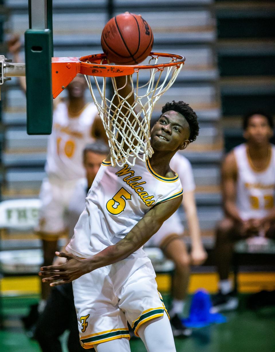 Brenen Lorient dunks the ball on a breakaway play in the second half for the Forest Wildcats in the Class 6A, Region 1 boys basketball semifinals Feb. 23, 2021, in Ocala.