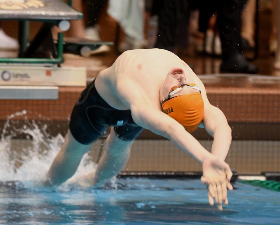 Hoover’s Brayden Peresie competes in the boys 100-yard backstroke in the Division I district meet at Cleveland State, Saturday, Feb. 17, 2024.