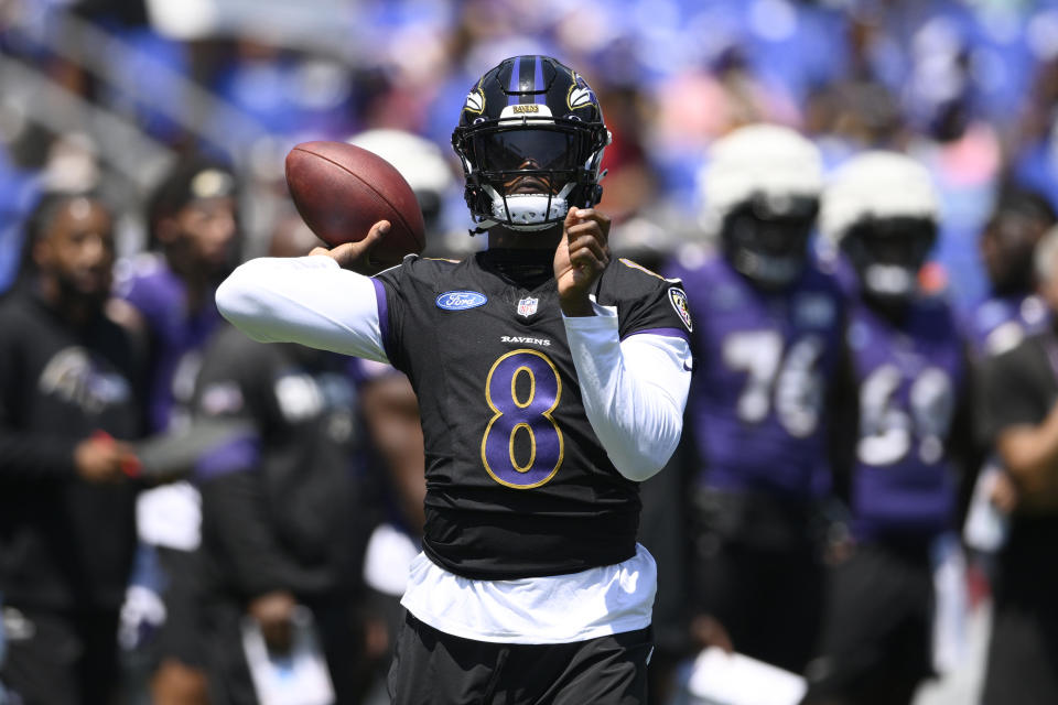 How will Lamar Jackson and the Ravens look on offense this season? Start with their new offensive coordinator and the weapons at his disposal. (AP Photo/Nick Wass)