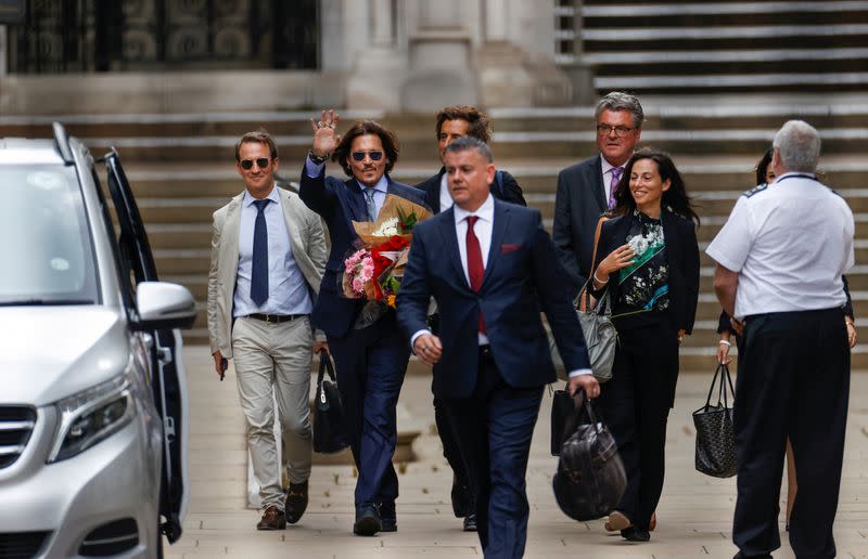 Actors Johnny Depp and Amber Heard at the High Court in London