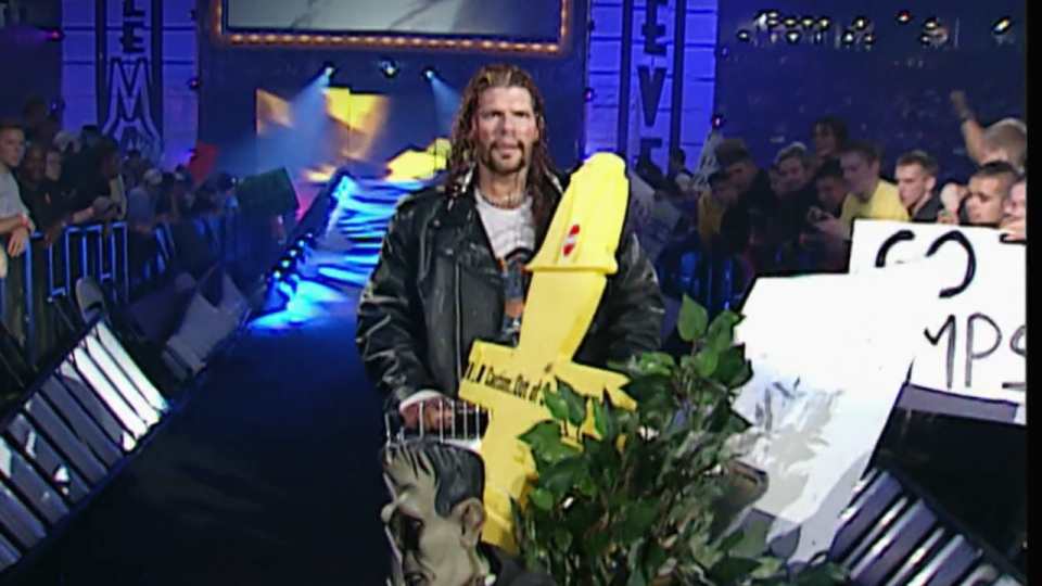 Raven pushing a shopping cart at WrestleMania X-Seven.