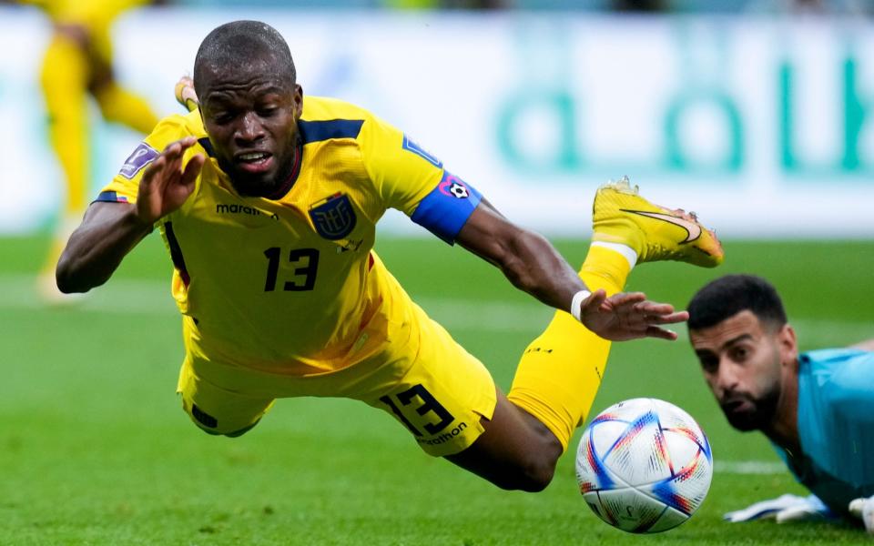 Ecuador's Enner Valencia falls, fouled by Qatar's goalkeeper Saad Al Sheeb - AP