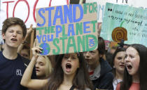 Young demonstrators take part in a demonstration organised by 'Global Strike 4 Climate' near Parliament in London, Friday, May 24, 2019. (AP Photo/Kirsty Wigglesworth)