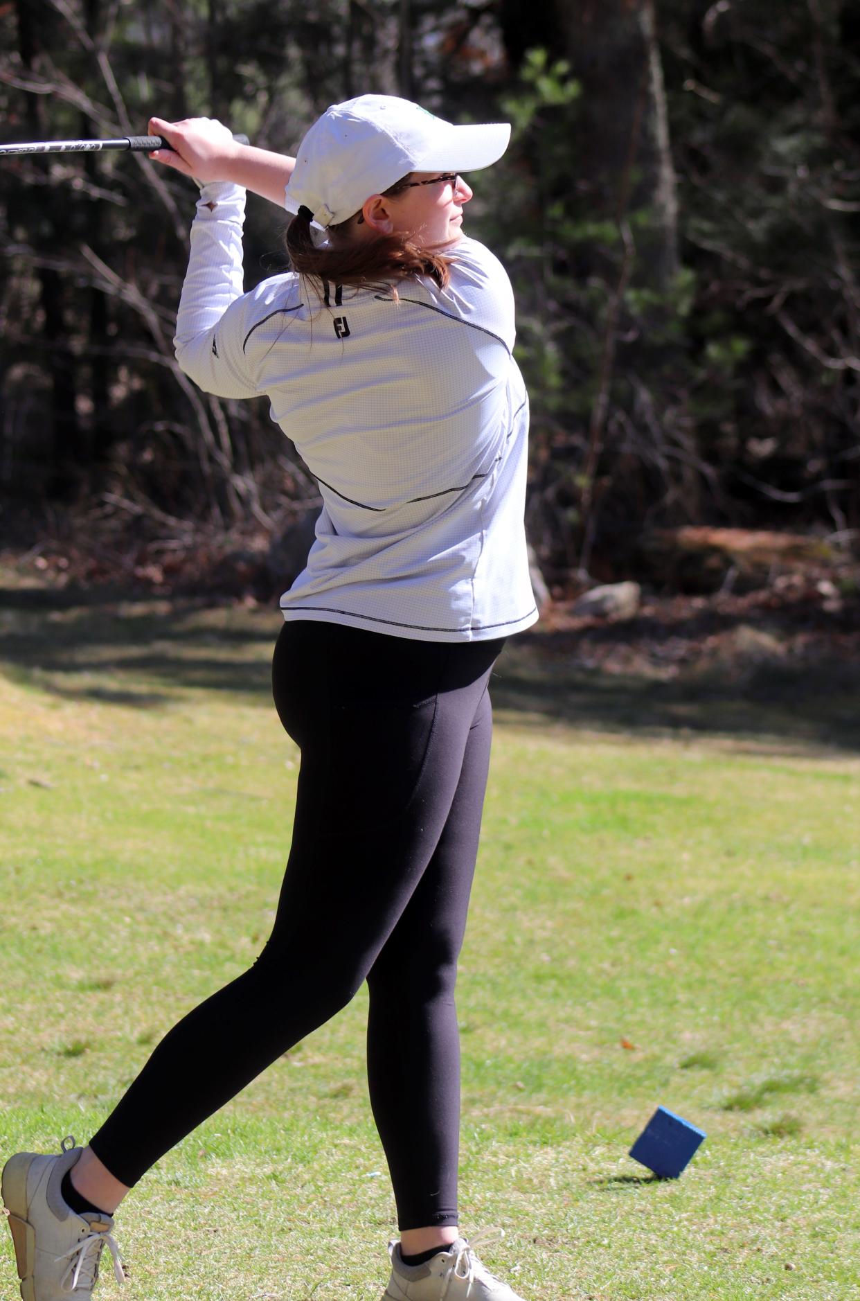 Wachusett's Lilly Sprister tees off from the first hole at Bedrock GC.