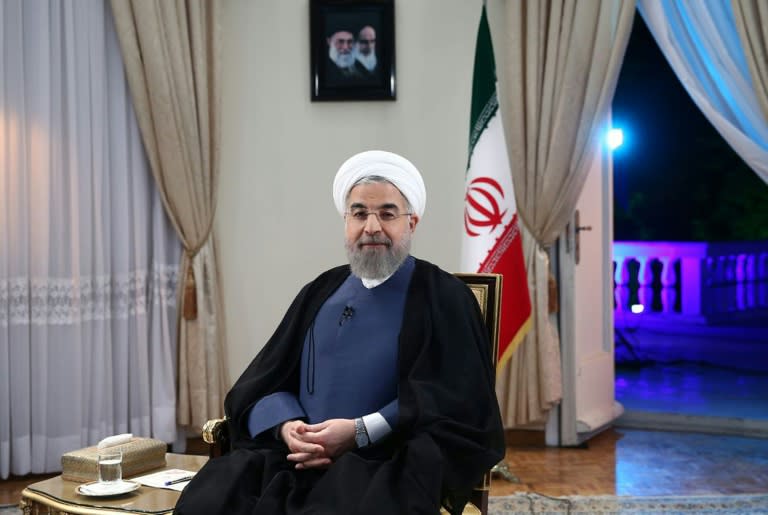 Iran and Turkey must work with one another to root out the threat of extremism in the region, President Hassan Rouhani, pictured in Tehran on August 2, 2015, told his Turkish counterpart