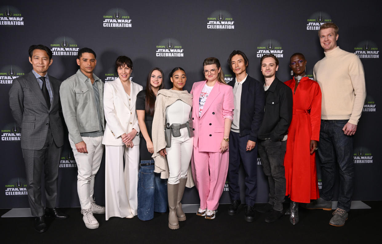 LONDON, ENGLAND - APRIL 07: The cast of The Acolyte (L-R) Lee Jung-Jae, Charlie Barnett, Rebecca Henderson, Dafne Keen, Amandla Stenberg, Leslye Headland, Manny Jacinto, Dean-Charles Chapman, Jodie Turner-Smith and Joonas Suotamo attend the studio panel at Star Wars Celebration 2023 in London at ExCel on April 07, 2023 in London, England. (Photo by Jeff Spicer/Getty Images for Disney)