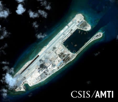 Fiery Cross Reef is shown in this handout satellite image dated September 3, 2015 and provided by CSIS Asia Maritime Transparency Initiative/Digital Globe September 14, 2015. REUTERS/CSIS Asia Maritime Transparency Initiative/Digital Globe/Handout via Reuters