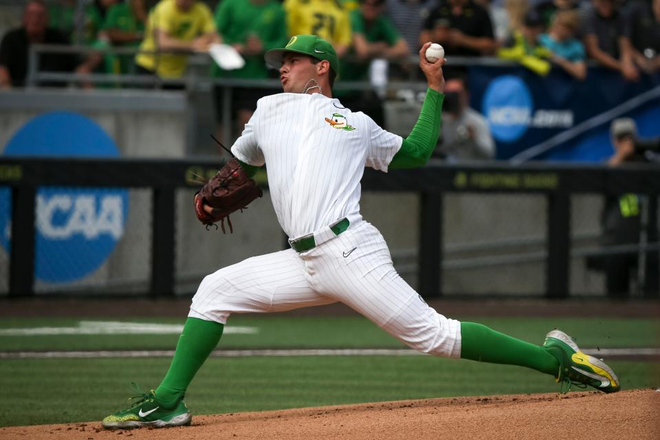 Oregon left-handed pitcher Grayson Grinsell throws out a pitch as the Oregon Ducks defeated Oral Roberts University 9-8 in the first game of a best of three NCAA Super Regional series at PK Park in Eugene, Ore. Friday, June 9, 2023. 