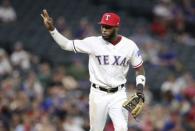 Aug 16, 2018; Arlington, TX, USA; Texas Rangers third baseman Jurickson Profar (19) reacts after the Texas Rangers record a triple play during the fourth inning against the Los Angeles Angels at Globe Life Park in Arlington. Kevin Jairaj-USA TODAY Sports