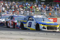 Chase Elliott (9) leads a group during a NASCAR Cup Series auto race Sunday, July 4, 2021, at Road America in Elkhart Lake, Wis. (AP Photo/Jeffrey Phelps)