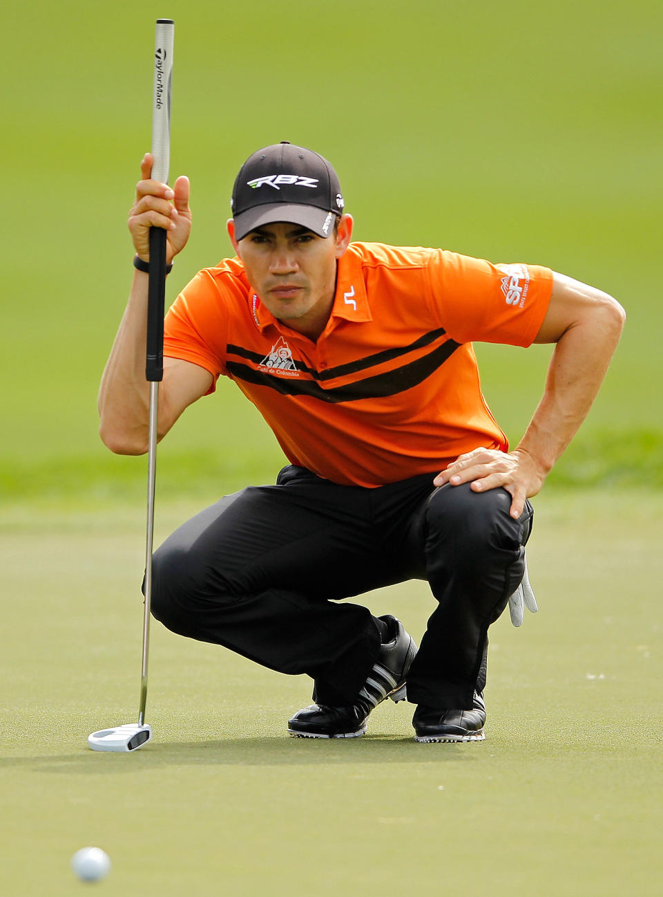 PALM BEACH GARDENS, FL - MARCH 01: Camilo Villegas of Colombia lines up a putt on the third hole during the first round of the Honda Classic at PGA National on March 1, 2012 in Palm Beach Gardens, Florida. (Photo by Mike Ehrmann/Getty Images)