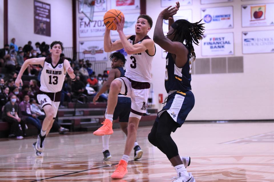 McMurry's CJ LeBlanc (3) goes up for a shot during Saturday's American Southwest Conference game against East Texas Baptist at Kimbrell Arena. LeBlanc scored a game-high 20 points in the 78-76 loss.