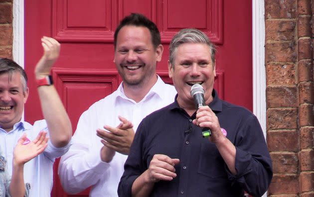 Winning Labour candidate Simon Lightwood stands behind Keir Starmer during the Wakefield by-election campaign. (Photo: Dave Higgens via PA Wire/PA Images)