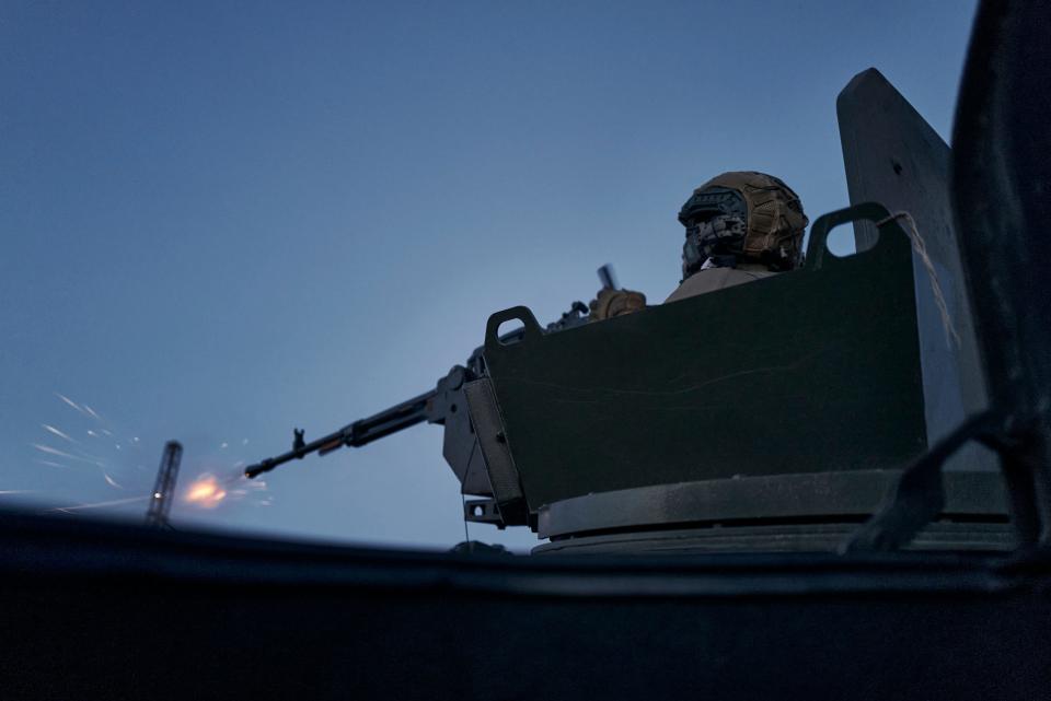 A Ukrainian soldier fires during battle in Avdiivka, Donetsk region, Ukraine, August 18, 2023.