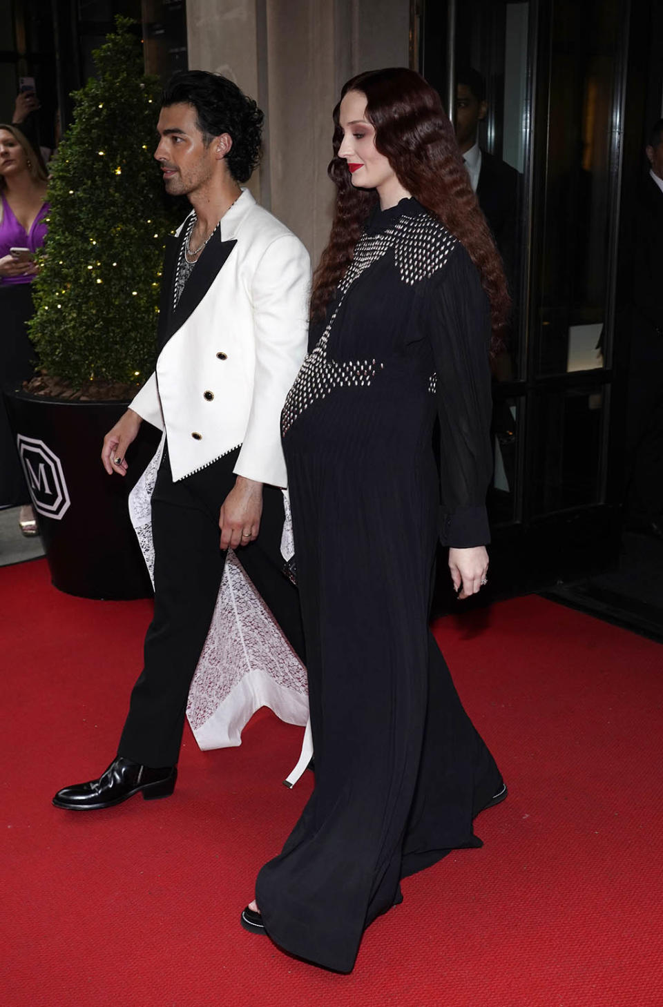 Joe Jonas and Sophie Turner depart The Mark Hotel prior to attending The Metropolitan Museum of Art’s Costume Institute benefit gala celebrating the opening of “In America: An Anthology of Fashion” on May 2, 2022, in New York. - Credit: Charles Sykes/Invision/AP