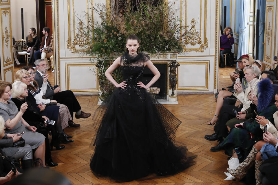 A model wears a creation for Valentin Yudashkin fashion collection during Women's fashion week Fall/Winter 2020/21 presented in Paris, Tuesday, March 3, 2020. (AP Photo/Francois Mori)