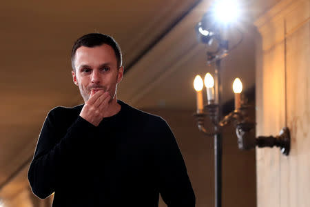 Designer Kris Van Assche appears at the end of his Fall/Winter 2019-2020 collection show for fashion house Berluti during Men's Fashion Week in Paris, France, January 18, 2019. REUTERS/Gonzalo Fuentes