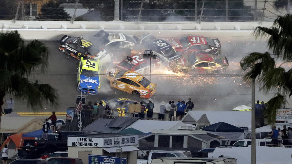 Multiple cars crash during a NASCAR Daytona 500 auto race on Feb. 17, 2019, at Daytona International Speedway in Daytona Beach, Fla. The crash included Austin Dillon (3), Daniel Suarez (41), David Ragan (38), Paul Menard (21), Ryan Newman (6), Aric Almirola (10), Matt DiBenedetto (95) and Ryan Blaney (12). (AP Photo/Chris O'Meara)