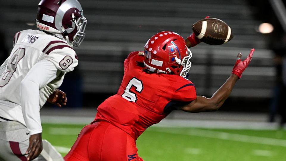 Manatee’s Torrey Gilley reaches to receive the ball against Sarasota Riverview at Joe Kinnan Field at Hawkins Stadium on Friday, Nov. 17, 2023.