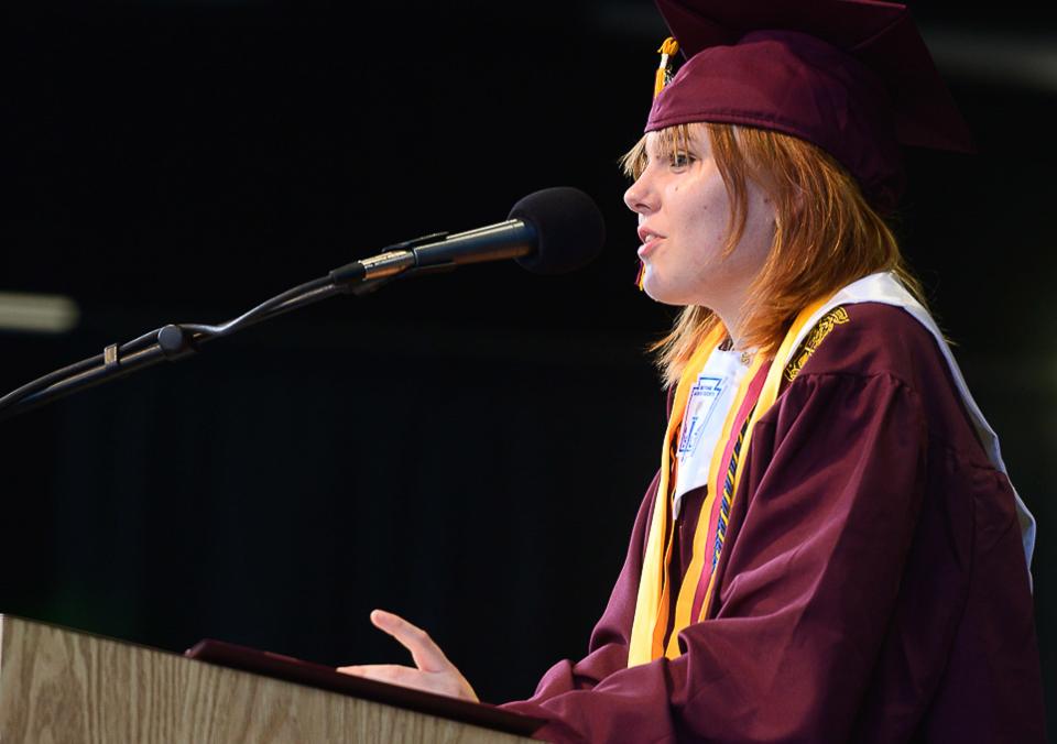 St. Augustine High School class of 2022 valedictorian Addison Smith talks to her classmates at the school's commencement ceremony at the St. Augustine Amphitheatre on Thursday, May 26, 2022.