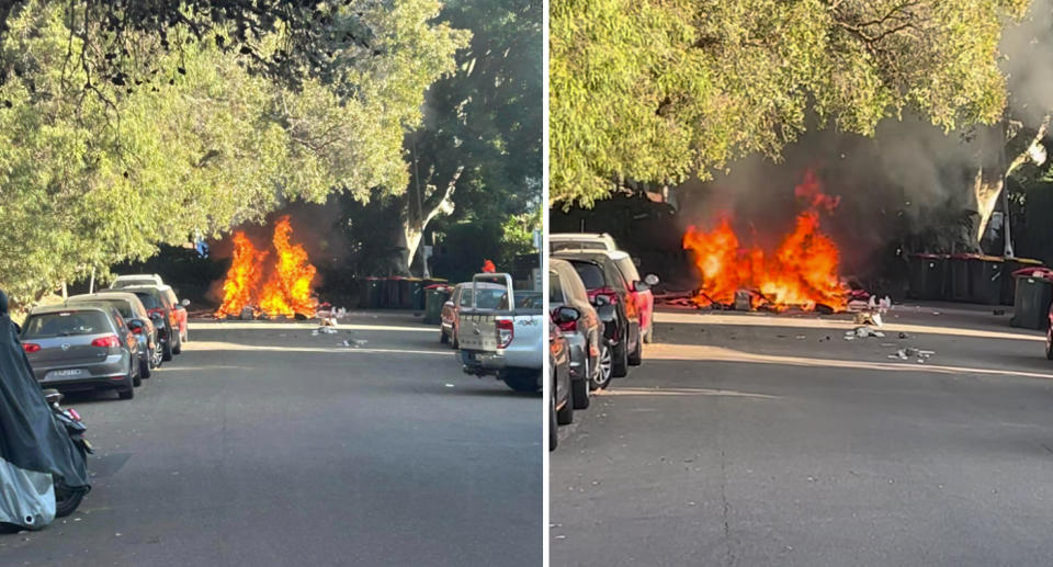 A fire burns near cars and trees in a Bondi cul-de-sac