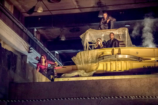 Stephen Amell as Oliver Queen, Willa Holland as Speedy, Katie Cassidy as Black Canary and David Ramsey as John Diggle