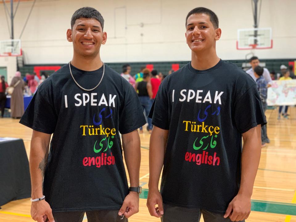 Sajjad and Mo Novrouzi volunteered to translate at a resource fair for refugees at Alhambra High School on Aug. 10, 2023. The siblings were born in Afghanistan, but lived for nine years at a refugee camp in Turkey, before moving to the U.S.