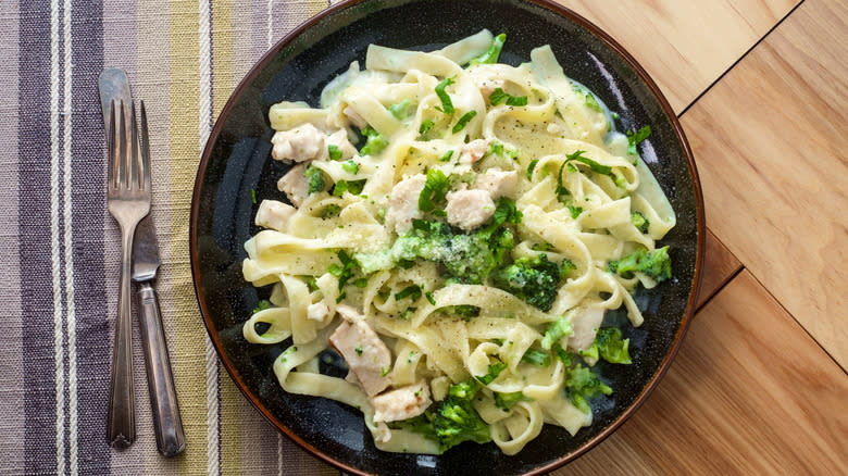 Broccoli and creamy pasta on plate