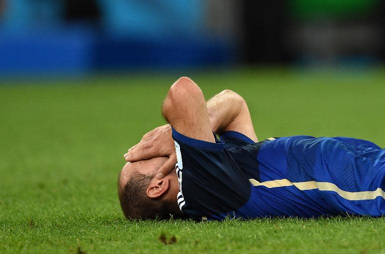 Argentina's midfielder Javier Mascherano reacts after his team loses to Germany at the World Cup final in Rio de Janeiro on July 13, 2014