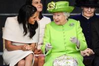 <p><a href="https://www.goodhousekeeping.com/life/a21525138/meghan-markle-first-royal-event-kate-middleton/" rel="nofollow noopener" target="_blank" data-ylk="slk:Going on a solo trip with the Queen;elm:context_link;itc:0;sec:content-canvas" class="link ">Going on a solo trip with the Queen</a> sounds extremely intimidating, but not when Her Majesty has good jokes prepared. After road-tripping it to Cheshire, the royals shared a cute moment as the Queen looks to be testing out a new jest on the New Duchess. Judging by Meghan's face, it must've been a real knee-slapper.</p>
