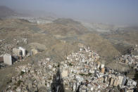 General view showing slums which on plan to be demolished to make way for towers in the Muslim holy city of Mecca, Saudi Arabia, Sunday, June 25, 2023. Saudi Arabia is pumping billions of dollars into the holy city of Mecca to meet its ambitious economic targets, with high-end hotels, apartment blocks, retailers and restaurants planned for areas around the Grand Mosque. (AP Photo/Amr Nabil)