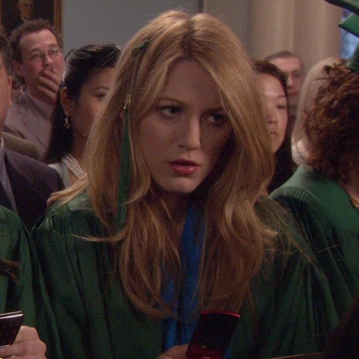 Serena and Blair sitting at their high school graduation 