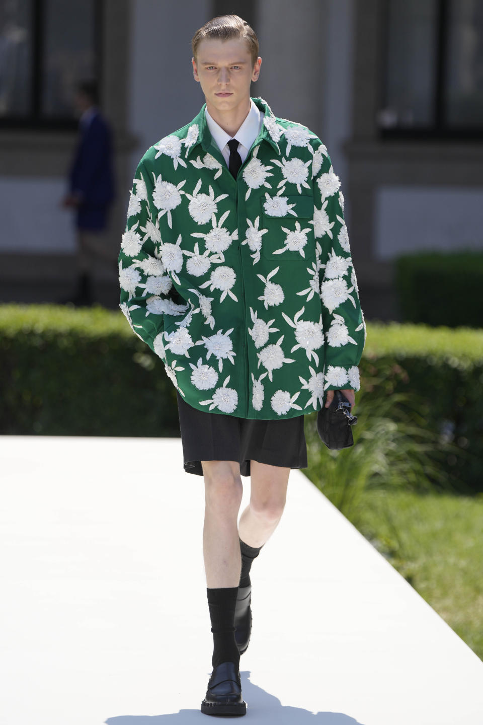 A model wears a creation as part of the Valentino men's Spring Summer 2024 collection presented in Milan, Italy, Friday, June 16, 2023. (AP Photo/Luca Bruno)