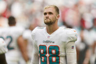 Miami Dolphins tight end Mike Gesicki (88) walks off the field at the end of an NFL football game, Sunday, Oct. 24, 2021, in Miami Gardens, Fla. The Falcons defeated the Dolphins 30-28l. (AP Photo/Wilfredo Lee)