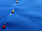 <body> <p>The stump of an old candle can safely store sharp needles, straight pins, or safety pins. Simply insert the pointy ends into the wax, and keep the makeshift pincushion nearby so you're prepared for any clothing crisis. </p> <p><strong>Related: <a rel="nofollow noopener" href=" http://www.bobvila.com/slideshow/18-clever-storage-solutions-you-can-diy-for-free-49712?bv=yahoo" target="_blank" data-ylk="slk:18 Clever Storage Solutions You Can DIY for Free;elm:context_link;itc:0;sec:content-canvas" class="link ">18 Clever Storage Solutions You Can DIY for Free</a> </strong> </p> </body>