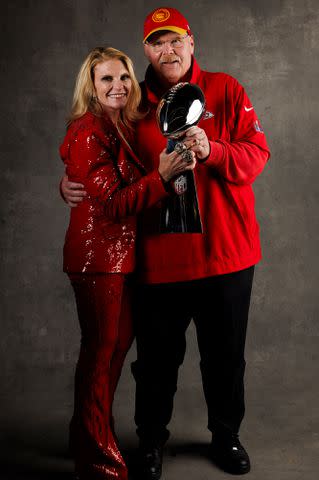 <p>Ryan Kang/Getty</p> Andy Reid and Tammy Reid pose for a portrait with the Vince Lombardi Trophy after Super Bowl LVIII against the San Francisco 49ers at Allegiant Stadium on February 11, 2024.
